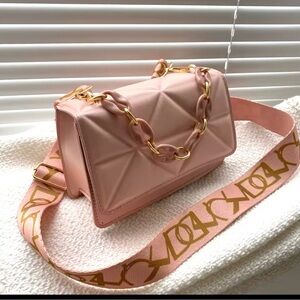 Elegant Pink Crossbody Bag with Gold Accents
